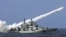  A Chinese warship launches a missile during a live-ammunition military drill held last year in the South China Sea. 