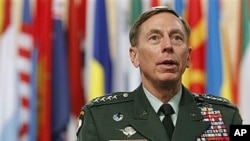 Top US and NATO commander in Afghanistan General David Petraeus waits for the start of a round table meeting at a NATO summit in Lisbon, November 20, 2010 (file photo)