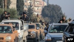 Çekdarên dijberên rejîma Sûrî li kolanên bajarê Hama, 6.12.2024