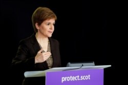 Scotland's First Minister Nicola Sturgeon speaks during the Scottish government's daily briefing on the coronavirus outbreak, at St. Andrew's House, Edinburgh, in this handout picture released by the Scottish Government on Oct. 2, 2020.