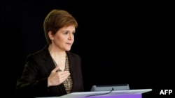 File- Scotland's First Minister Nicola Sturgeon speaks during the Scottish government's daily briefing on the coronavirus outbreak, at St. Andrew's House, Edinburgh, in this handout picture released by the Scottish Government on Oct. 2, 2020.