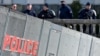 Des policiers à une barrière anti-émeute à l'ancien aéroport de Notre-Dame-des-Landes, à Nantes, le 19 mars 2018.