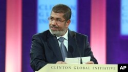 Presiden Mesir Mohammed Morsi berbicara tentang tantangan yang dihadapi negaranya dan kawasan Timur Tengah dalam forum Clinton Global Initiative di New York, Selasa (25/9).