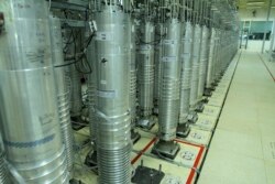 FILE - This photo released Nov. 5, 2019 by the Atomic Energy Organization of Iran shows centrifuge machines at the Natanz uranium enrichment facility in central Iran.