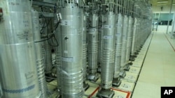 FILE - This photo released Nov. 5, 2019, by the Atomic Energy Organization of Iran shows centrifugs in the Natanz uranium enrichment facility in central Iran. 