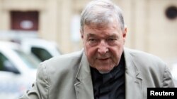 Cardinal George Pell arrives at the County Court in Melbourne, Australia, Feb. 26, 2019. 