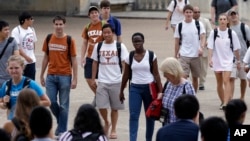 FILE - At the University of Texas in Austin, a campus that was once slow to integrate, the student body, like the state, is "majority-minority." 