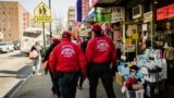 Guardian Angels patrol the streets in Queens. (Photo by Tariq Cilione)