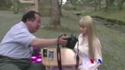 အရုပ်မ ခင်ပွန်းနဲ့ ကြောင်ရုပ်ချစ်သူ