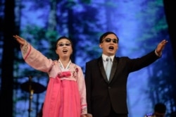 Visually-impaired singers perform during an event to mark the International Day of Persons with Disabilities, in Pyongyang, Dec. 3, 2019.