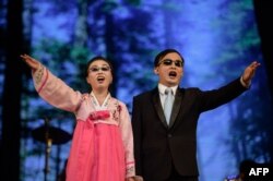 Visually-impaired singers perform during an event to mark the International Day of Persons with Disabilities, in Pyongyang, Dec. 3, 2019.