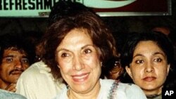 Begum Nusrat Bhutto, widow of Pakistan's executed prime minister Zulfikar Ali Bhutto and mother of assassinated Pakistani prime minister Benazir Bhutto leaves Karachi airport in this undated file photo.