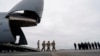 FILE - U.S. President Joe Biden and other officials attend the transfer of the remains of Army Reserve Sergeants William Rivers, Kennedy Sanders and Breonna Moffett, who were killed in Jordan during a drone attack, at Dover Air Force Base in Dover, Delaware, on Feb. 2, 2024.