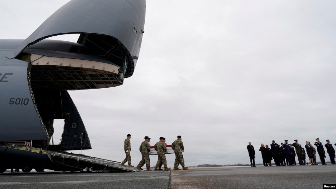 FILE - U.S. President Joe Biden and other officials attend the transfer of the remains of Army Reserve Sergeants William Rivers, Kennedy Sanders and Breonna Moffett, who were killed in Jordan during a drone attack, at Dover Air Force Base in Dover, Delaware, on Feb. 2, 2024.