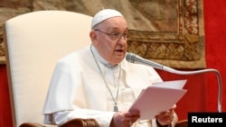 FILE - Pope Francis delivers his yearly address to the diplomatic corps accredited to the Vatican, sometimes called his "State of the World" address, at the Vatican January 8, 2024.