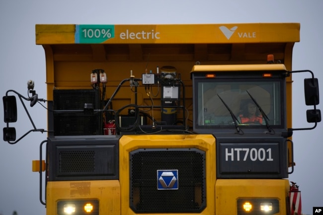 An employee drives an electric dump truck at PT Vale Indonesia's mine in Sorowako, South Sulawesi, Indonesia, Tuesday, Sept. 12, 2023. (AP Photo/Dita Alangkara)