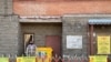 Kazakhstan – A man is standing near quarantined house during the COVID-19 pandemic in the capital city of Nur-Sultan. 17Apr2020