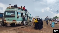 FILE - People displaced from eastern areas of Sudan's al-Jazira state arrive at Gedaref city on Oct. 27, 2024. Migration experts said on Oct. 29 that Sudan's displacement crisis is worsening as fighting continues and civilians face hunger and sexual violence.