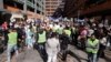 FILE - Hundreds of protesters rally outside the Immigration Department offices in Sydney, Australia, Aug. 12, 2019. The protest was to highlight the uncertain futures of many refugees since Australia had replaced permanent protection visas with temporary visas. 