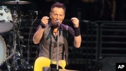 FILE - Legendary rocker Bruce Springsteen performs in concert with the E Street Band during "The River Tour 2016" in Philadelphia, Pennsylvania, Feb. 12, 2016. 