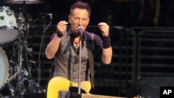 FILE - Bruce Springsteen performs in concert with his E Street Band during "The River Tour 2016" in Philadelphia, Pennsylvania, Feb. 12, 2016. 