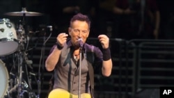 FILE - Bruce Springsteen performs in concert with the E Street Band during "The River Tour 2016" in Philadelphia, Feb. 12, 2016. Springsteen has canceled his concert in North Carolina, citing the state's new law blocking anti-discrimination rules covering