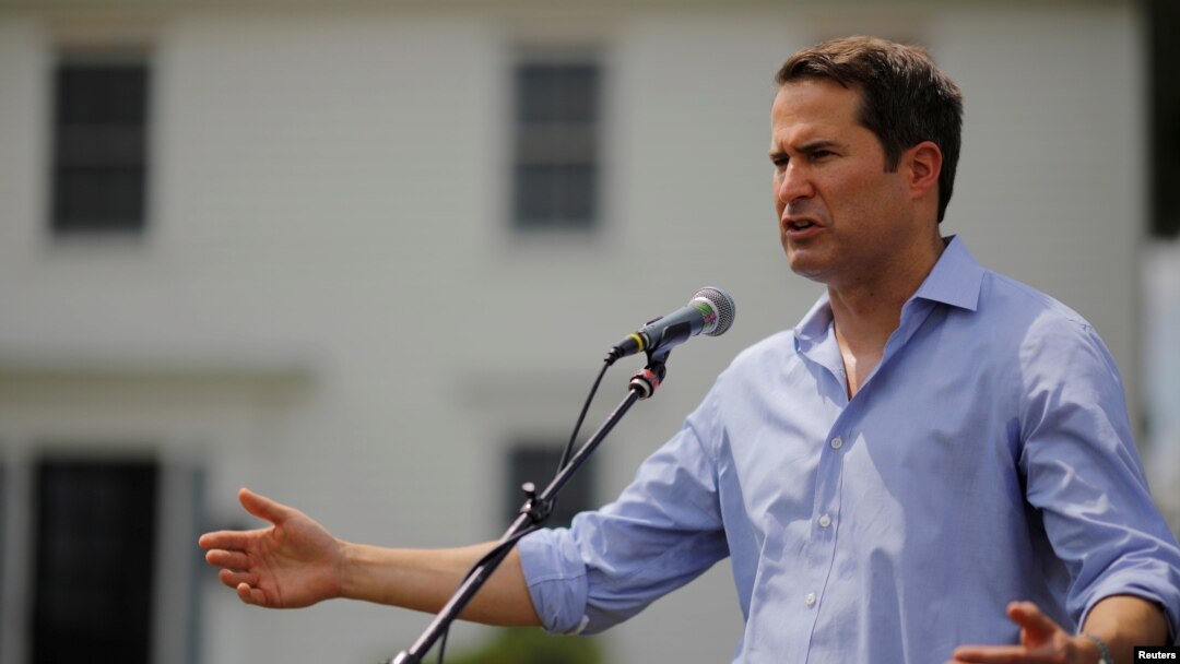 FILE - Congressman Seth Moulton (D-MA) speaks at a Merrimack County Democrats Summer Social at the Swett home in Bow, New Hampshire, July 28, 2018. 