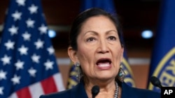 FILE - Rep. Deb Haaland, D-N.M., Native American Caucus co-chair, speaks to reporters on Capitol Hill in Washington, March 5, 2020.