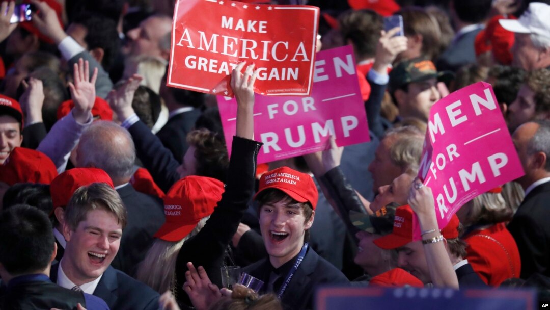 Supporters cheer as they wait for President-elect Donald Trump to give his acceptance speech during his election night rally, Nov. 9, 2016, in New York. 