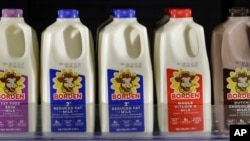 Borden milk rests on a shelf in a cooler in Richmond Heights, Ohio, Jan. 6, 2020.