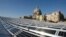 FILE - A photo shows solar panels on the roof of the Paul VI Hall, at the Vatican.