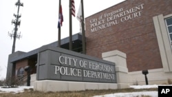 FILE - The entrance to the Ferguson, Mo., Police Department.