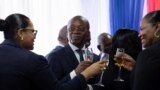 FILE—Haiti's new interim Prime Minister Michel Patrick Boisvert holds a glass with a drink after a transitional council took power with the aim of returning stability to the country, where gang violence continues, on the outskirts of Port-au-Prince, Haiti April 25, 2024. 