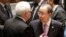 U.N. Secretary-General Ban Ki-moon, right, talks with Vitaly Churkin, Russia's U.N. ambassador, before a Security Council meeting at U.N. headquarters, Sept. 30, 2015. 