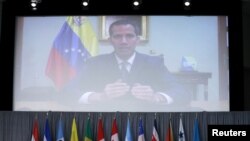 Pemimpin oposisi Venezuela, Presiden sementara Juan Guaido saat memberikan pidato pembuka di pertemuan Grup Lima di Ottawa, Ontario, Canada, 4 Februari 2019. (Foto: Reuters)