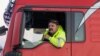 A Polish truck driver takes part in a border blockade near Hrebenne, Poland, on Dec. 4, 2023. Truckers are protesting what they call "unfair" competition from Ukrainian companies. The blockade is causing delays getting material to Ukraine's battlefields as it fights Russia.