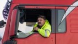 A Polish truck driver takes part in a border blockade near Hrebenne, Poland, on Dec. 4, 2023. Truckers are protesting what they call "unfair" competition from Ukrainian companies. The blockade is causing delays getting material to Ukraine's battlefields as it fights Russia.