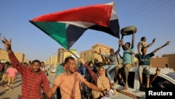 Rally marking the anniversary of the April uprising, in Khartoum