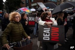 FILE - Israeli women demand the immediate release of the Israeli hostages held in the Gaza Strip by the Hamas militant group at a protest in Tel Aviv, Israel, January 24, 2024.