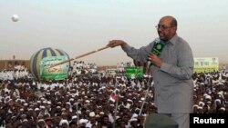 President Omar Hassan al-Bashir addresses a crowd, orders stoppage of all South Sudan's oil exports, in North Khartoum, Sudan, June 8, 2013.