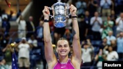 Aryna Sabalenka of Belarus poses with her trophy after the final of the women’s singles on day 13 of the U.S. Open tennis tournament at the USTA Billie Jean King National Tennis Center. (Mike Frey-Imagn Images)