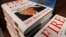 A stack of reserved "Fire and Fury" books by writer Michael Wolff sit on a shelf in a bookstore in Richmond, Va., Jan. 5, 2018. 