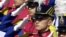 FILE - South Korean cadets salute South Korean President Kim Dae-jung during a graduation ceremony of the 58th military academy of South Korea, at the Hwarang drill field in Seoul.