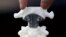 FILE - A spine model implanted with a 3D-printed artificial axis is displayed at Peking University Third Hospital in Beijing, China, Aug. 14, 2014. 