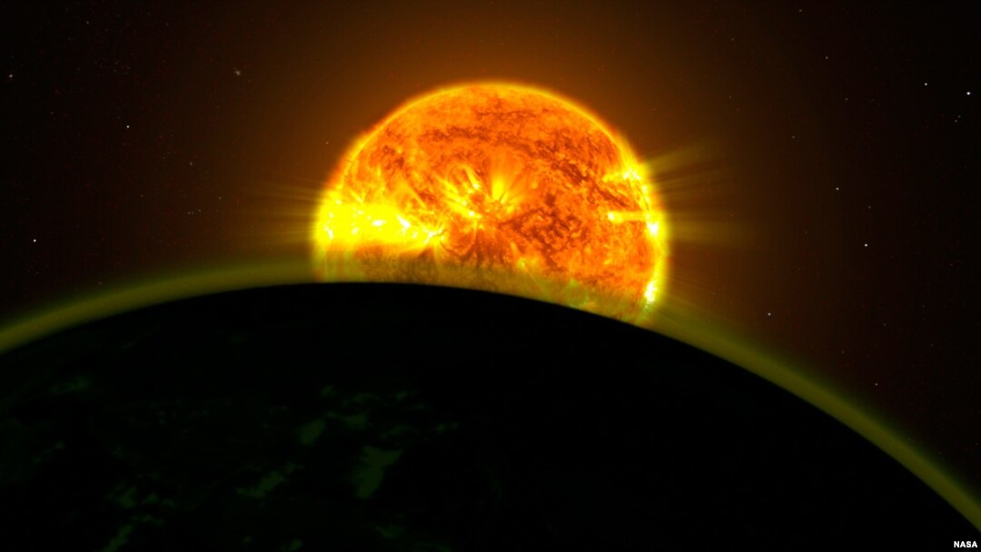 NASA scientists found faint signatures of water in the atmospheres of five distant planets orbiting three different stars. All five planets appear to be hazy. This illustration shows what one of them might look like. 