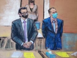 Former Minneapolis police officer Derek Chauvin and his defense attorney Eric Nelson rise to greet jury members on the twelfth day of Chauvin's trial, in Minneapolis, Minnesota, April 13, 2021, in this courtroom sketch.