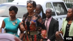 FILE: Marry Chiwenga, center, arrives at Harare Magistrate Court, in Harare, Zimbabwe, Dec. 16, 2019. (Columbus Mavhunga/VOA)