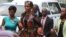 FILE: Marry Chiwenga, center, arrives at Harare Magistrate Court, in Harare, Zimbabwe, Dec. 16, 2019. (Columbus Mavhunga/VOA)
