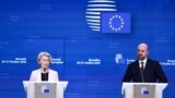 European Commission President Ursula von der Leyen (L) and European Council President Charles Michel speak as they hold a press conference during a European Union summit, at the EU headquarters in Brussels, on October 27, 2023.