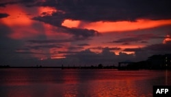 A cloudy sunset is seen before the arrival of Hurricane Helene, in Steinhatchee, Florida, on Sept. 25, 2024. 